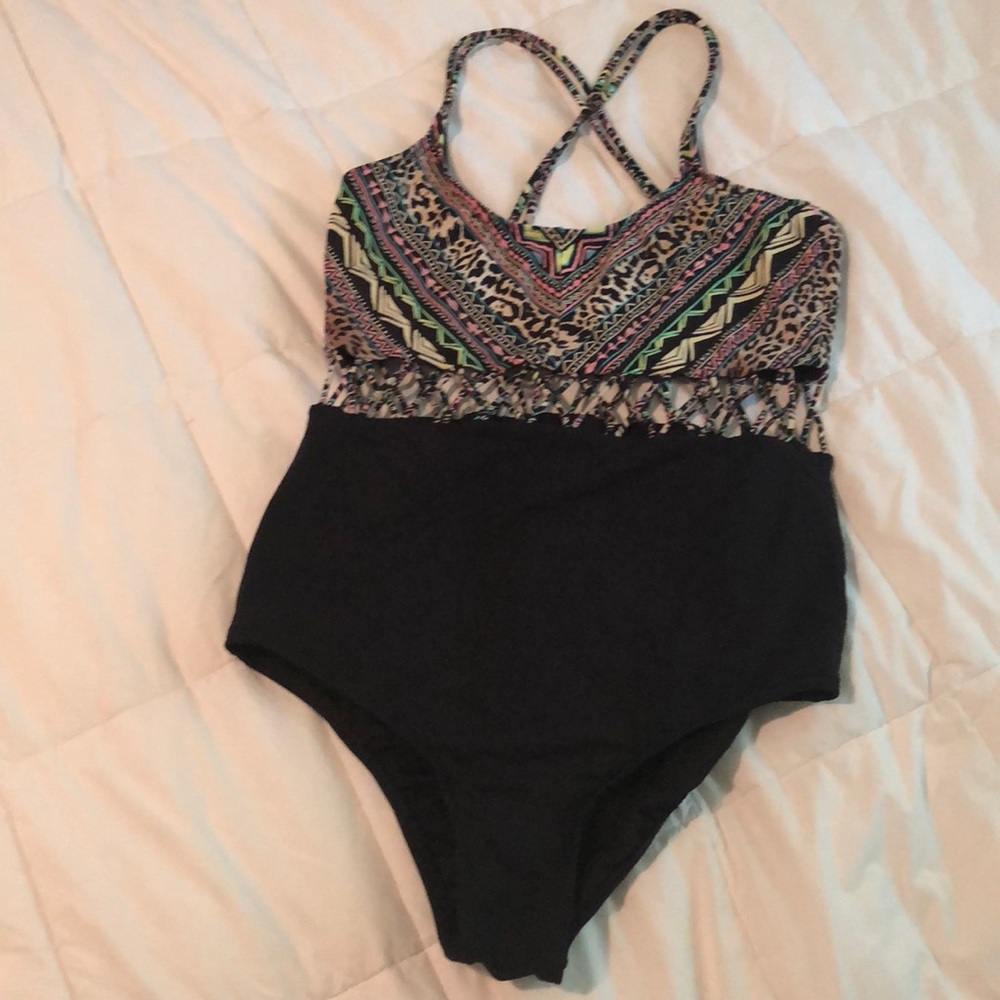 Woman’s Billabong one piece Swimsuit. Size Medium